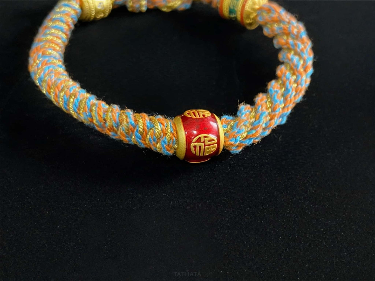 A mantra fortune woven tibetan bracelet.