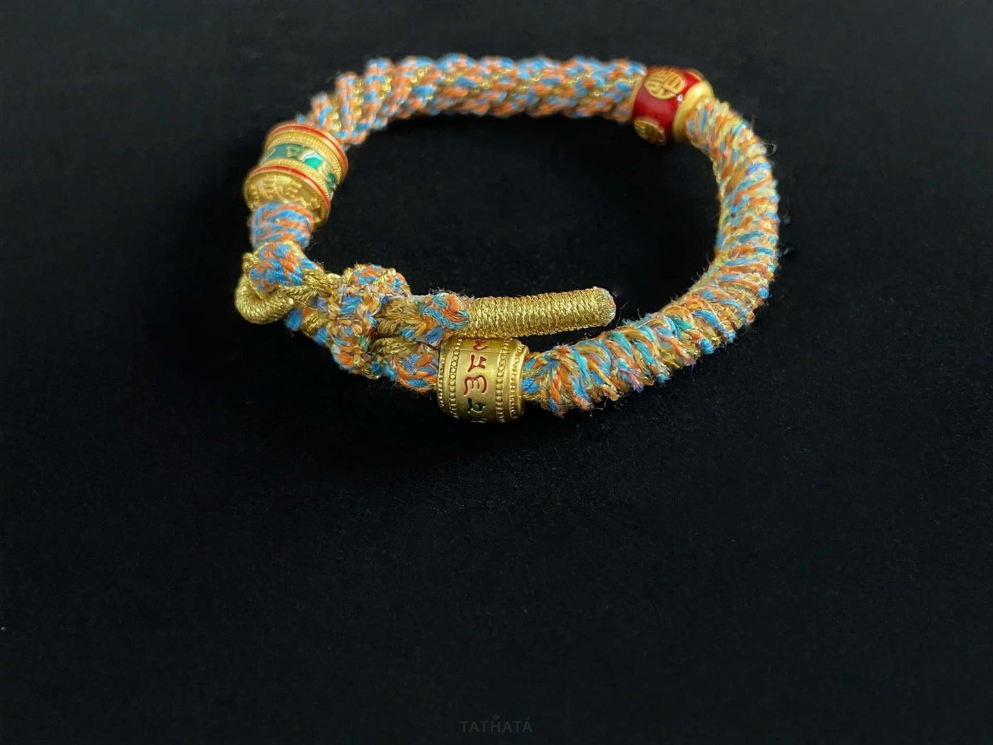 A mantra fortune woven tibetan bracelet.