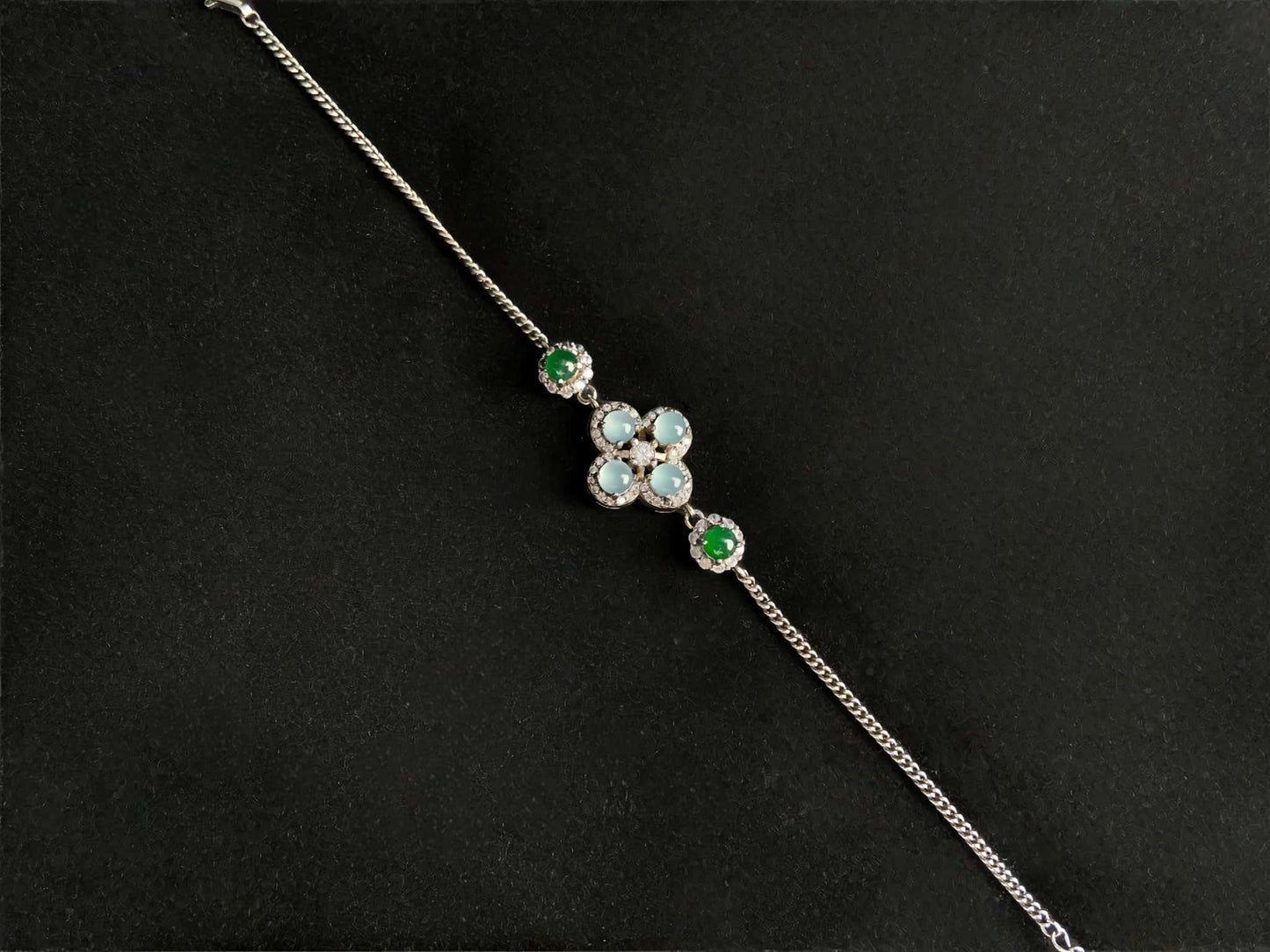 A sky green clover jadeite bracelet.