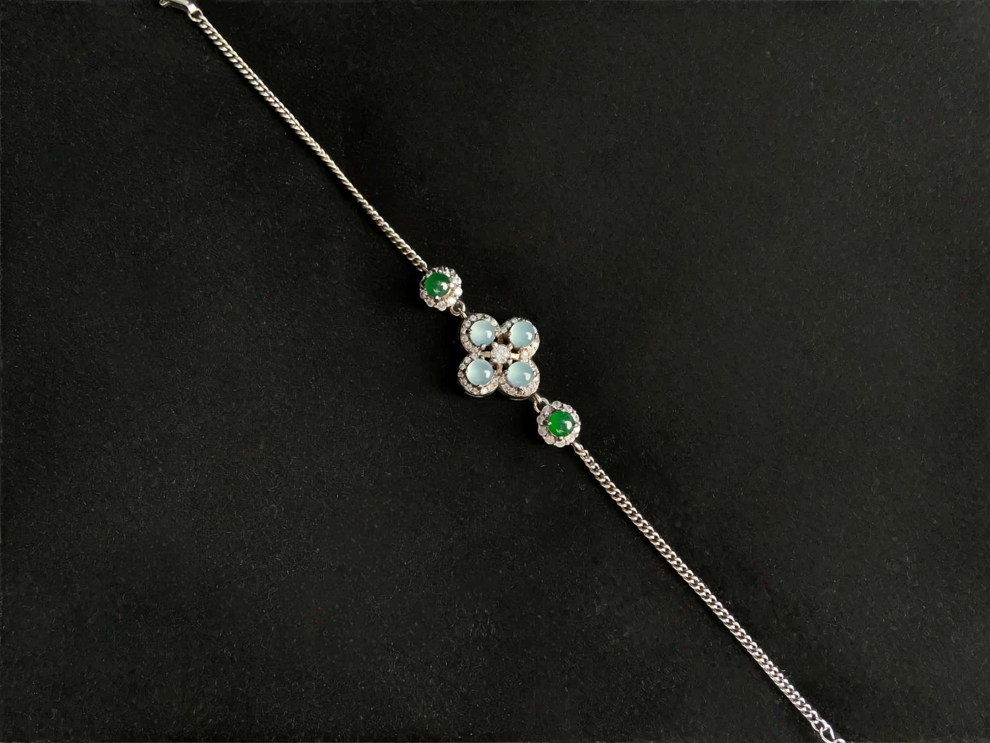 A sky green clover jadeite bracelet.