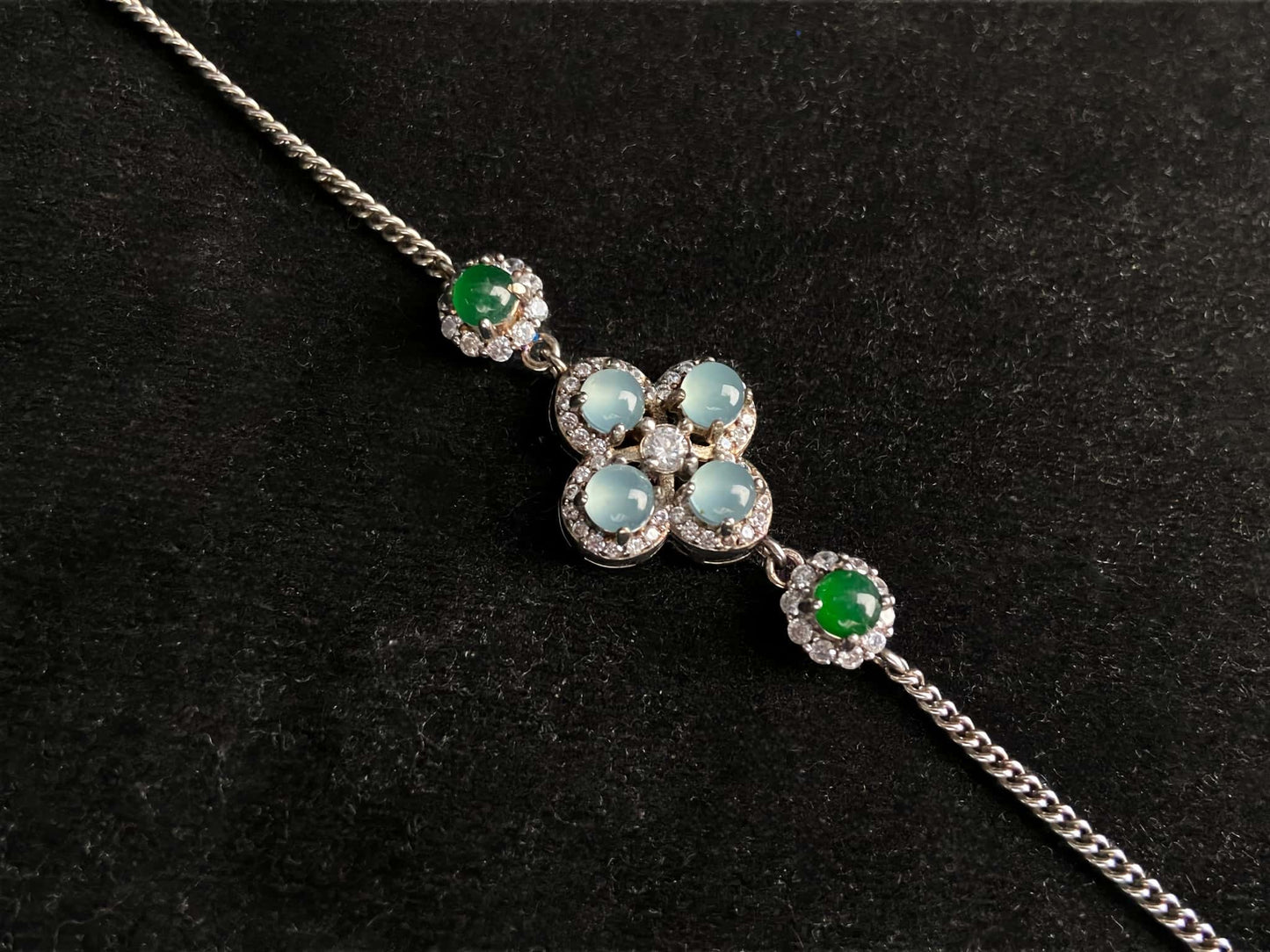 A sky green clover jadeite bracelet.
