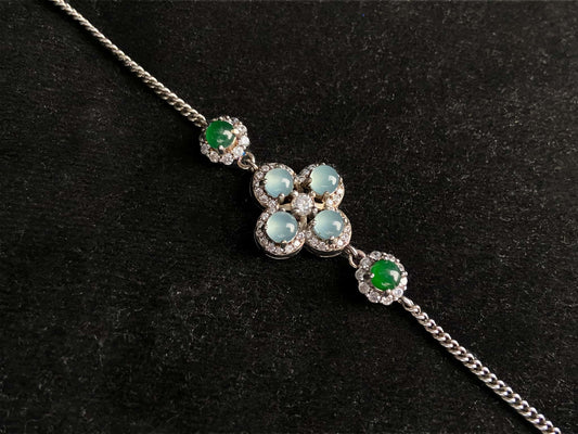 A sky green clover jadeite bracelet.
