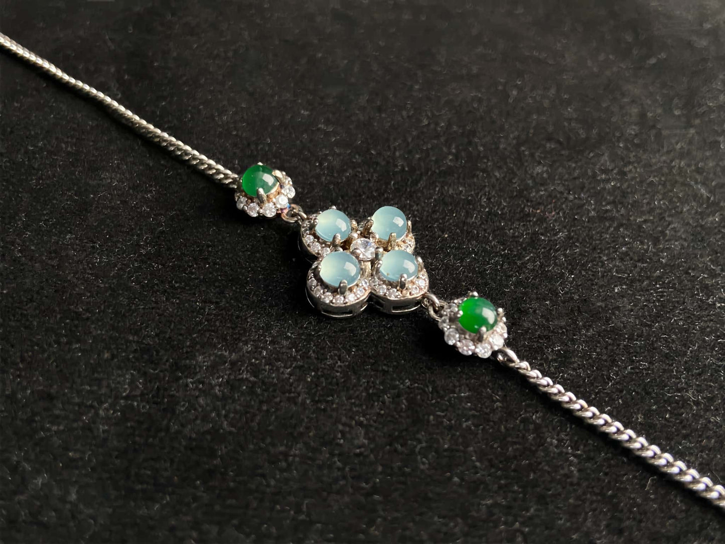 A sky green clover jadeite bracelet.