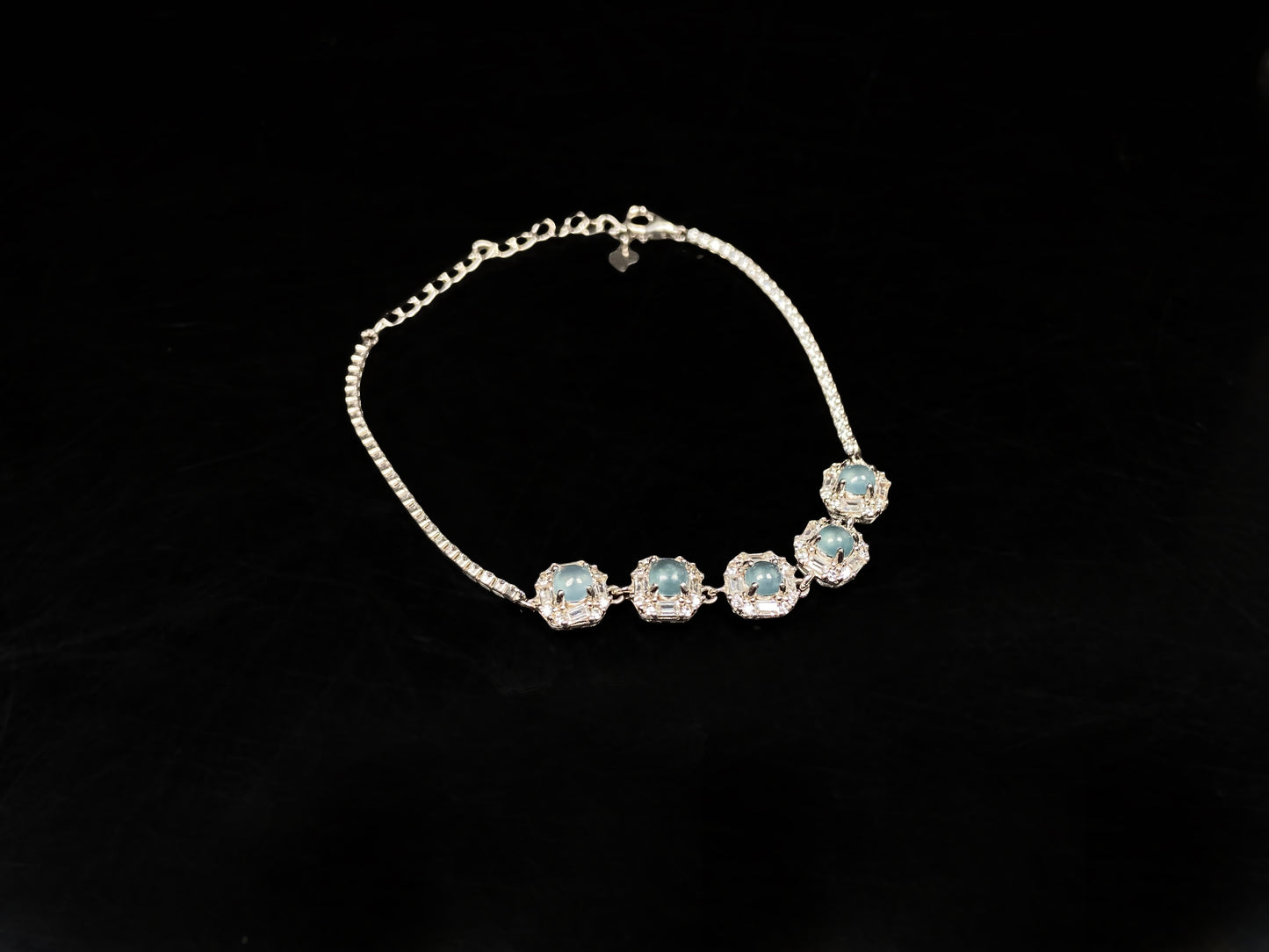 A glacial blue dewy clust jadeite  bracelet.