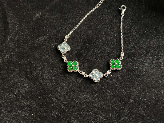 A lucky green ice clover jadeite  bracelet.