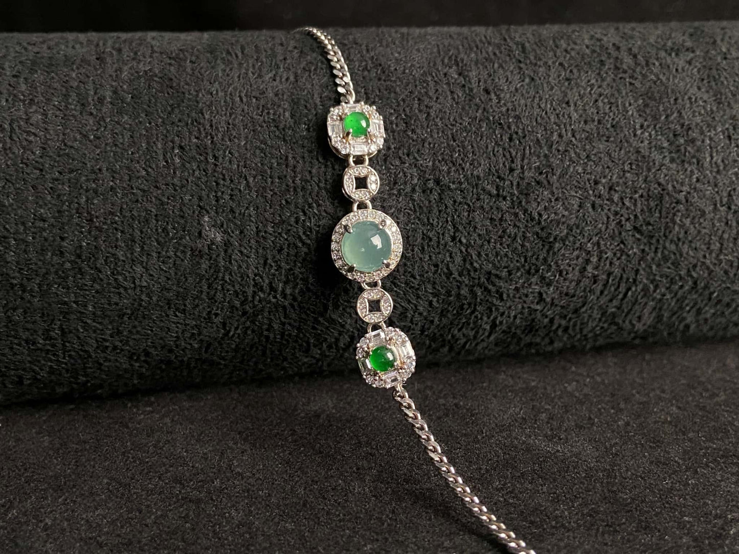 A green aqua fortune link jadeite  bracelet.