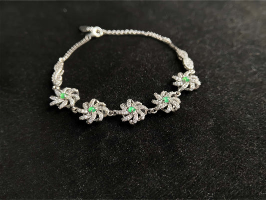 A lime green flowerburs jadeite bracelet.