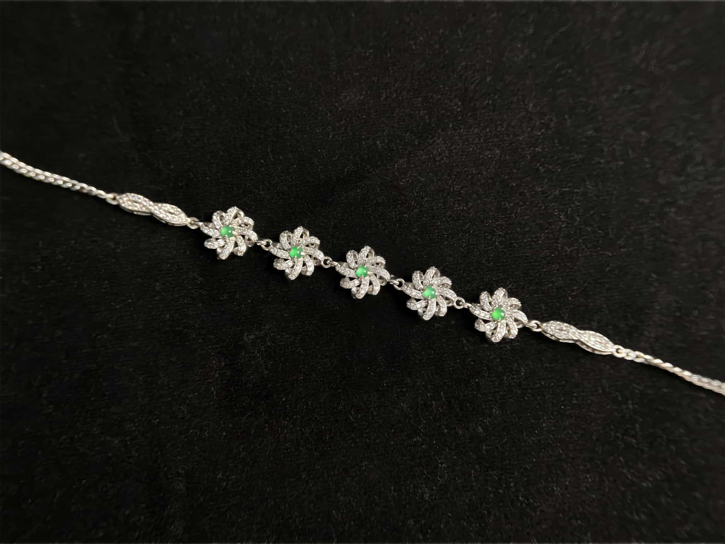 A lime green flowerburs jadeite bracelet.