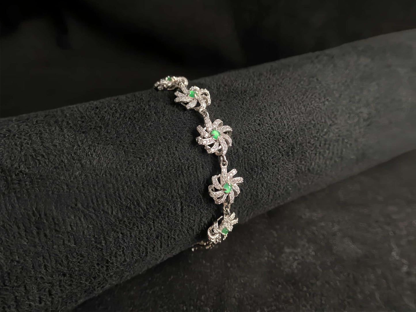 A lime green flowerburs jadeite bracelet.