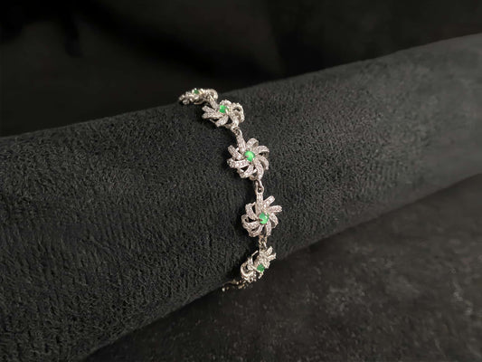 A lime green flowerburs jadeite bracelet.