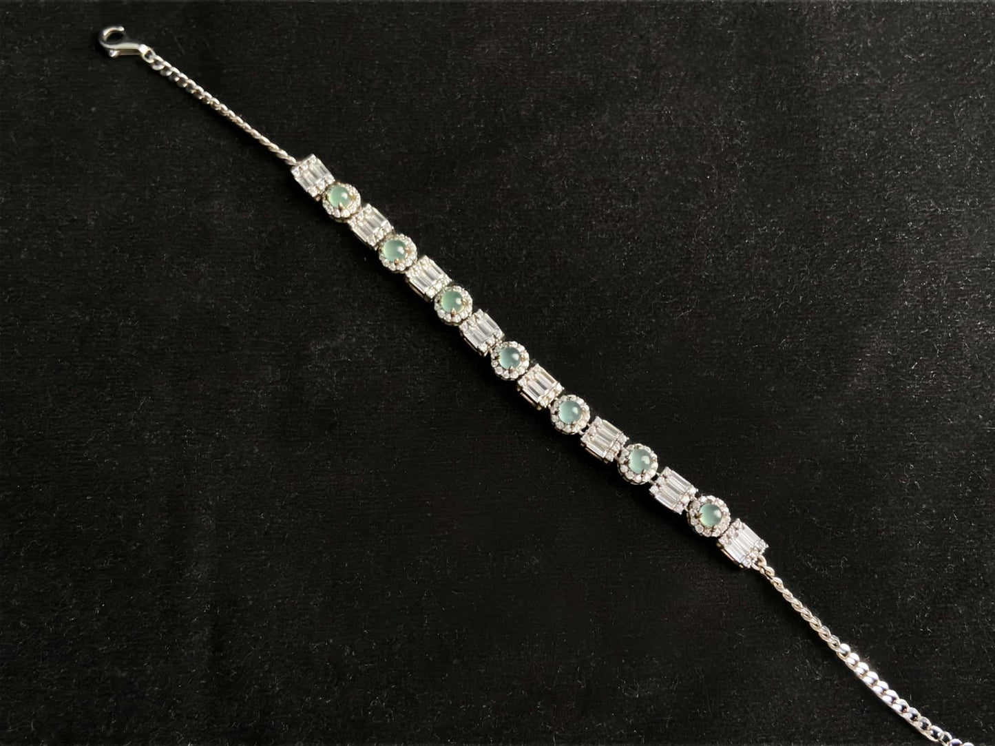 A aqua tidal baguette jadeite  bracelet.