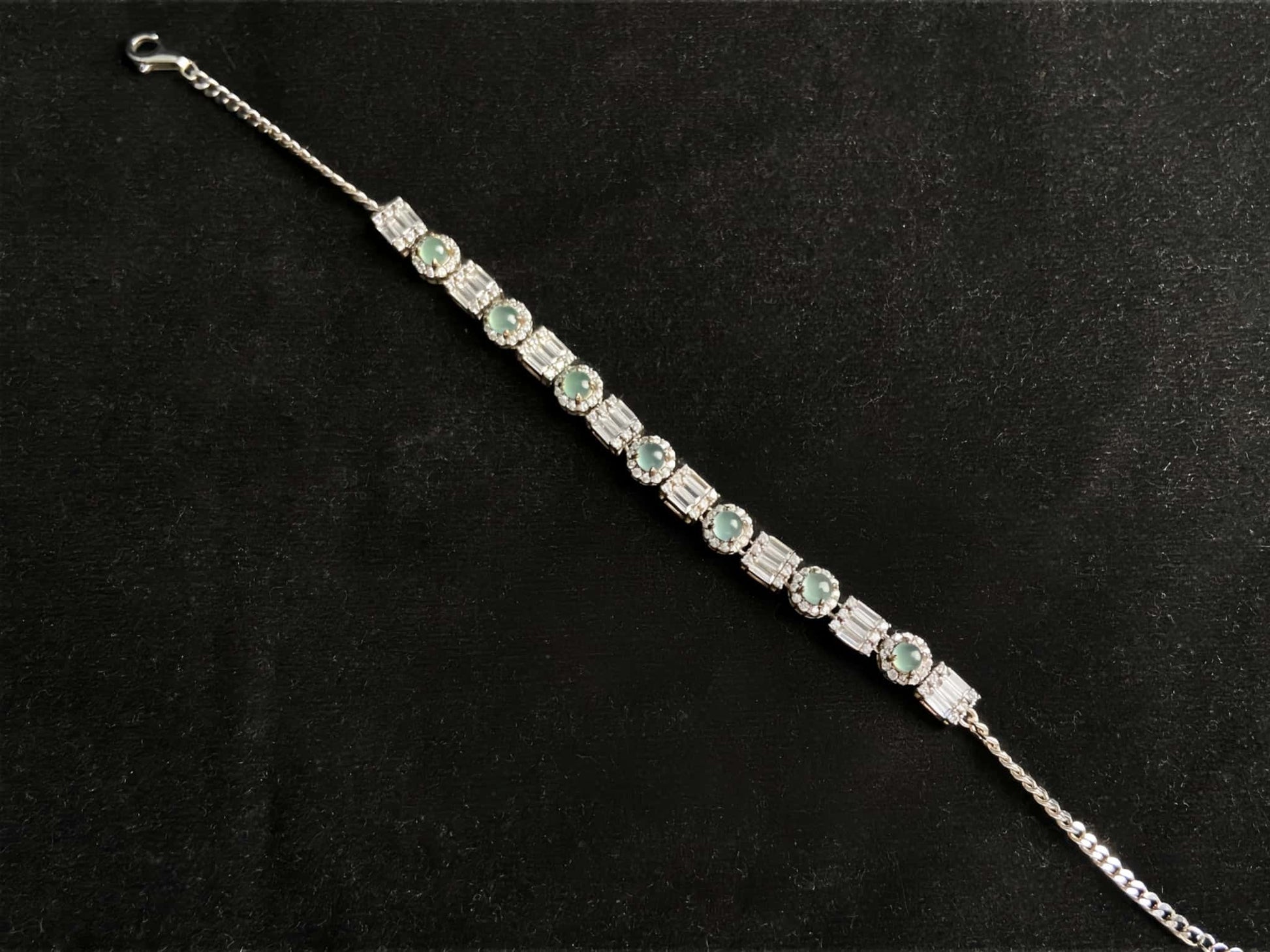 A aqua tidal baguette jadeite  bracelet.
