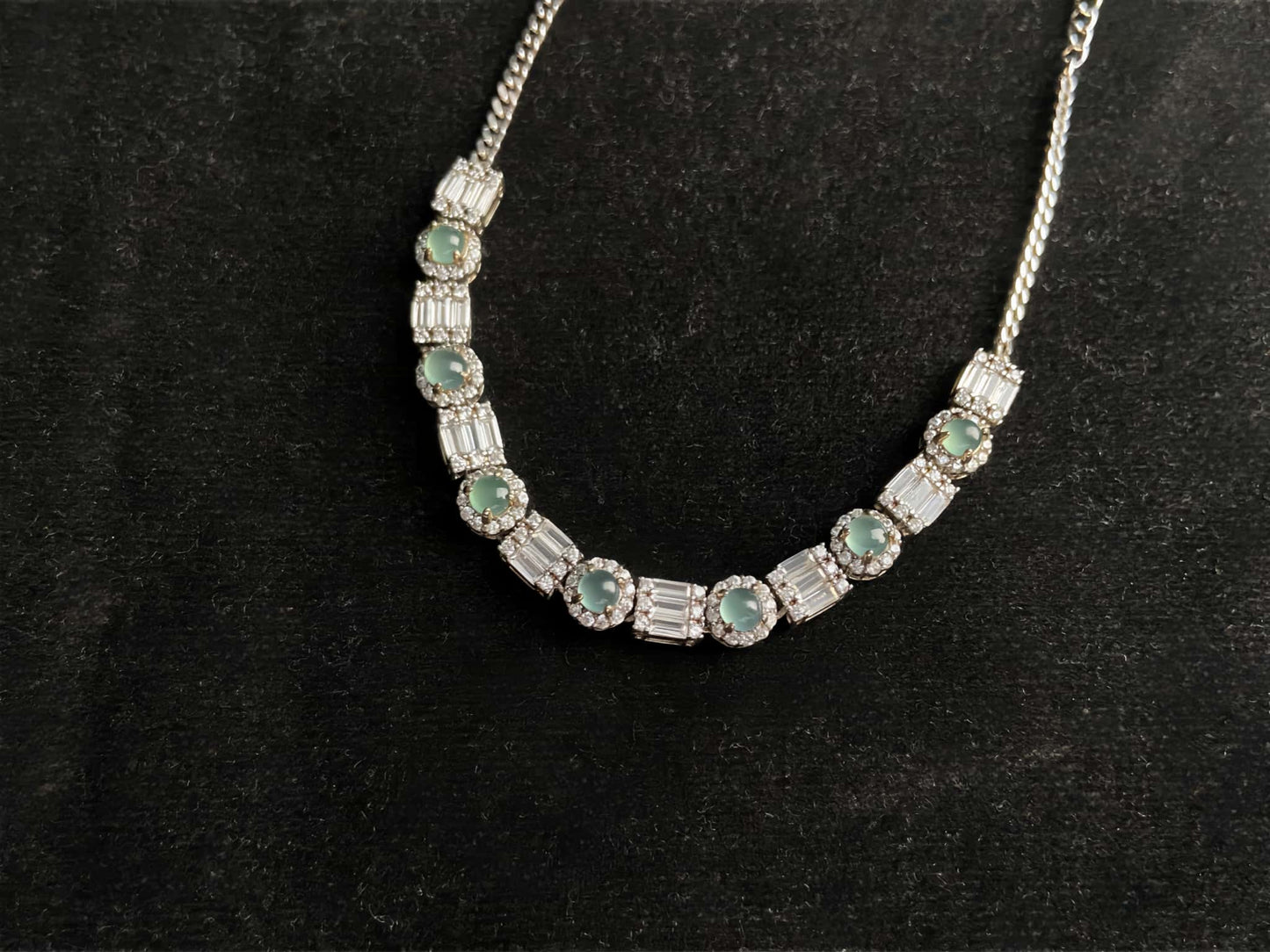 A aqua tidal baguette jadeite  bracelet.