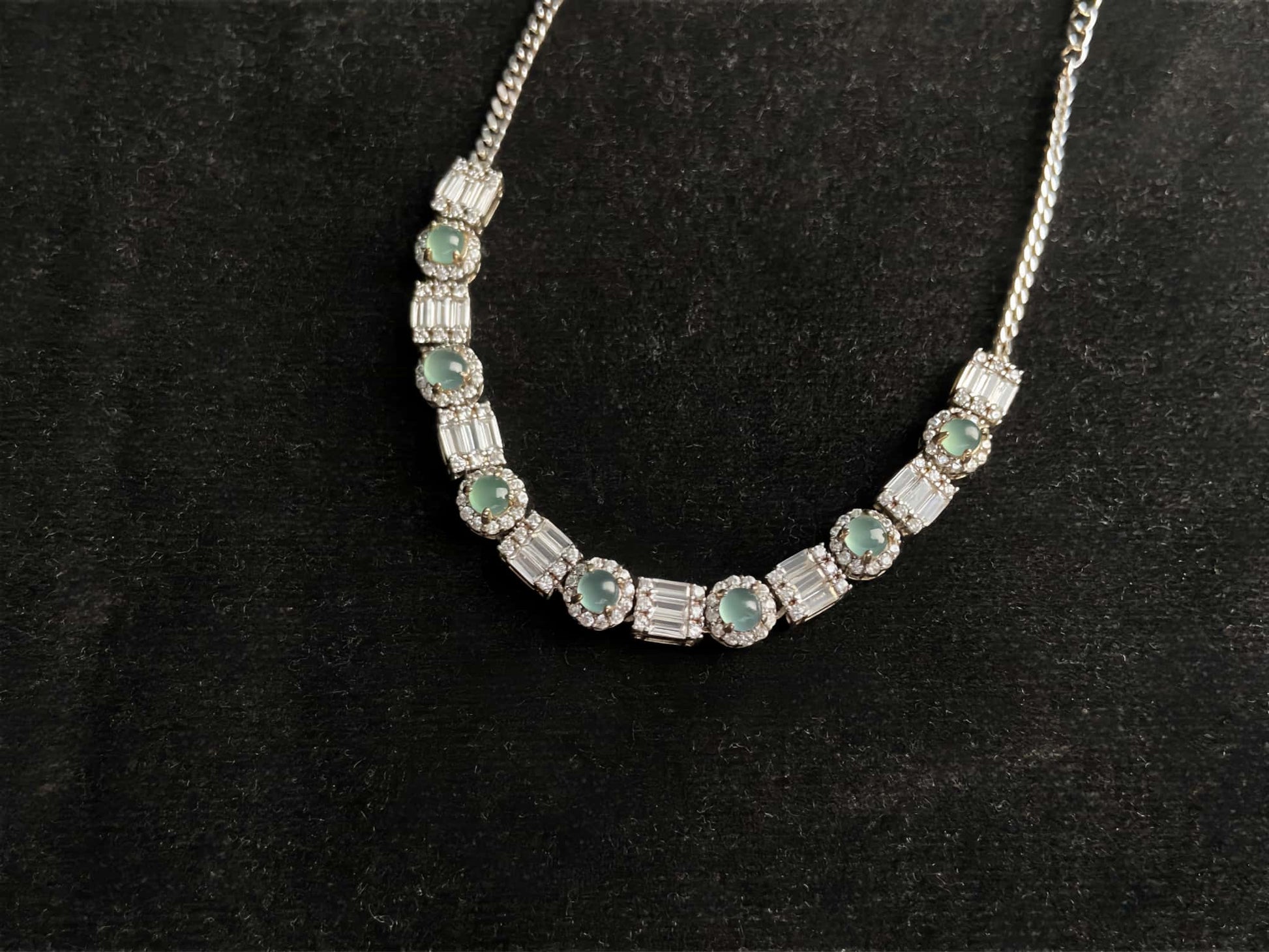 A aqua tidal baguette jadeite  bracelet.