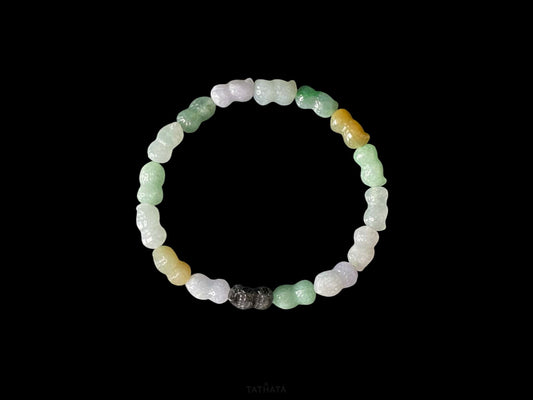 A multi color peanut jadeite beads bracelet.