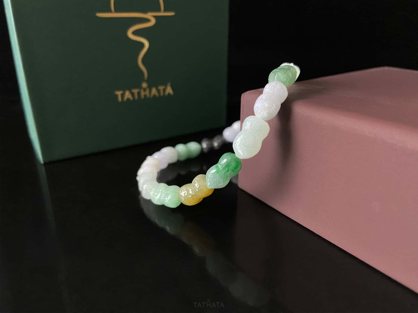 A multi color peanut jadeite beads bracelet.