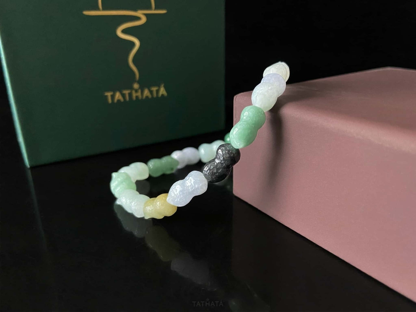 A multi color peanut jadeite beads bracelet.