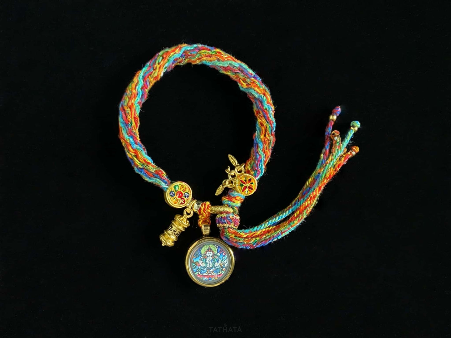 A chenrezig gau ainbow woven bracelet.