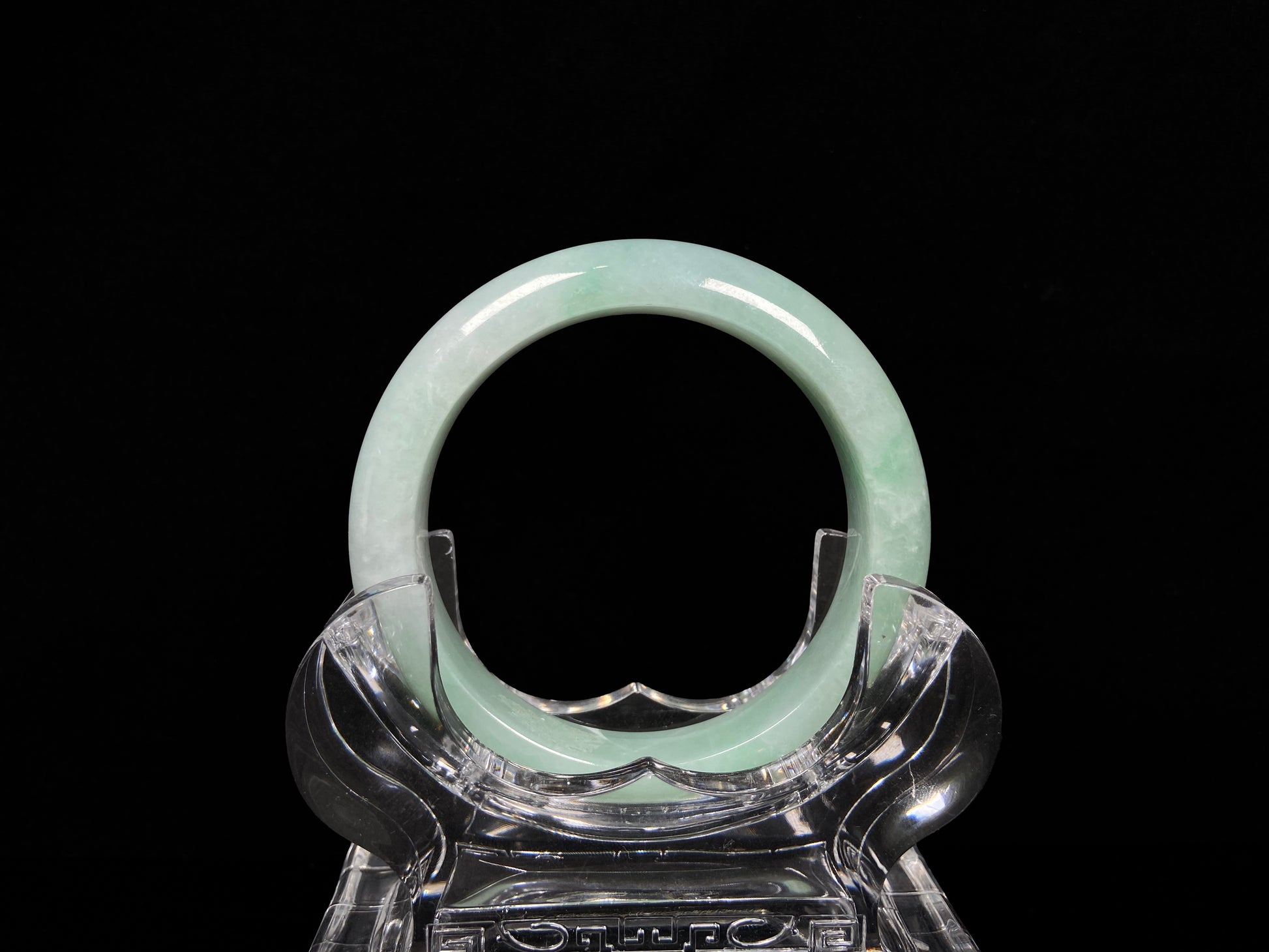 A apple green crisp bloom jadeite bangle.