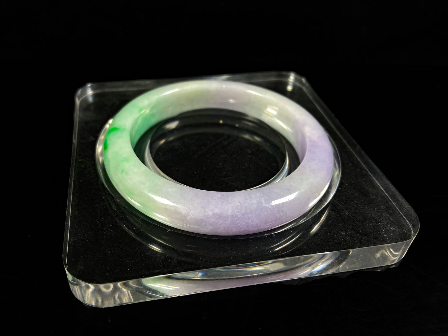 A lavender kissed spring jadeite bangle.