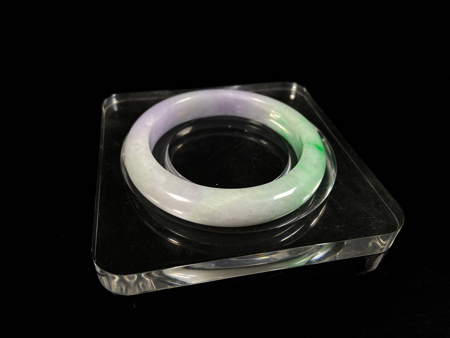 A lavender kissed spring jadeite bangle.
