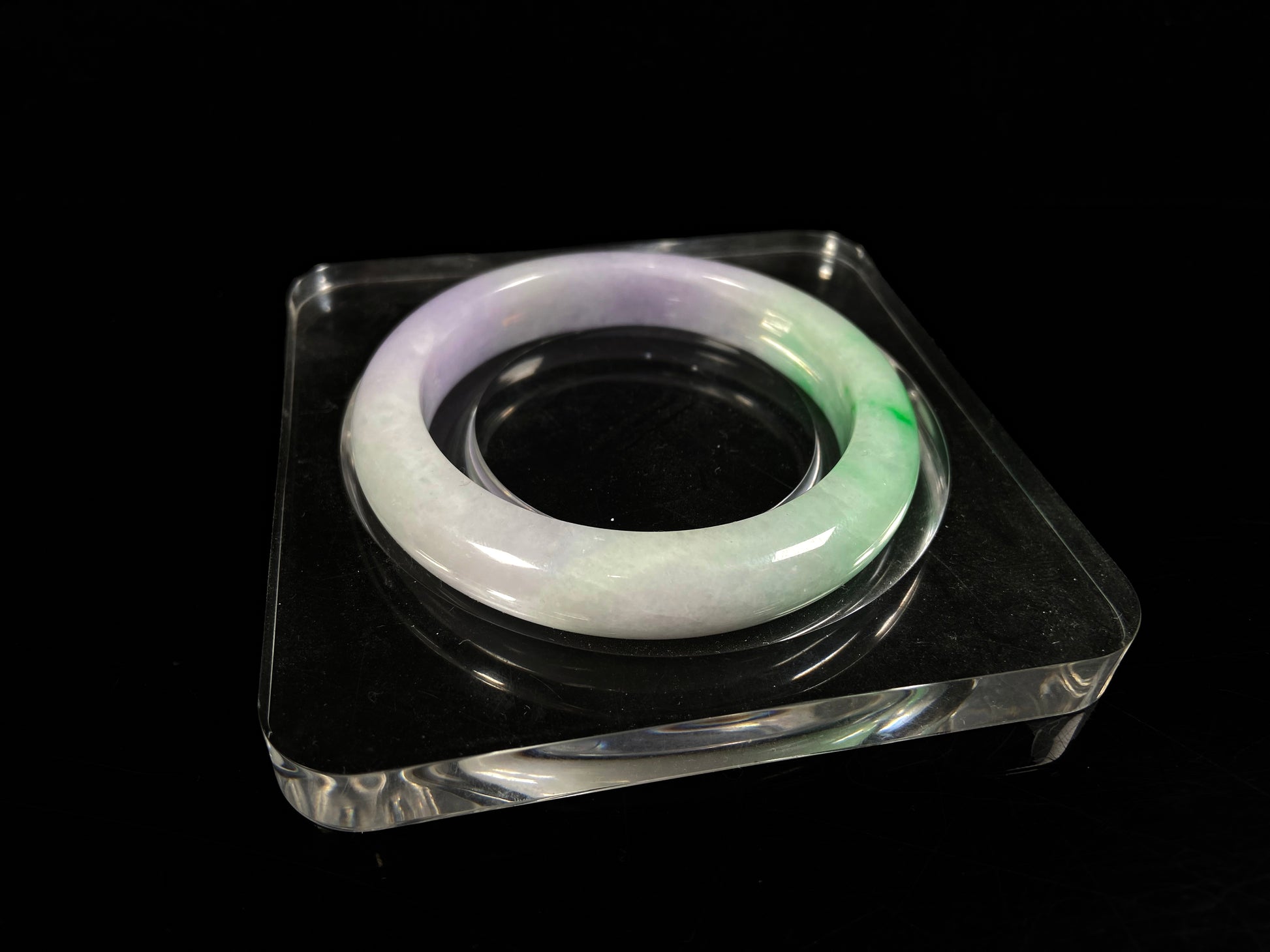 A lavender kissed spring jadeite bangle.