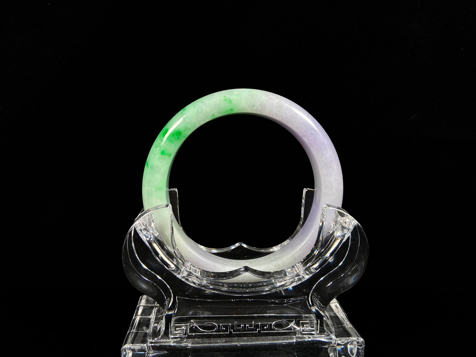 A lavender kissed spring jadeite bangle.