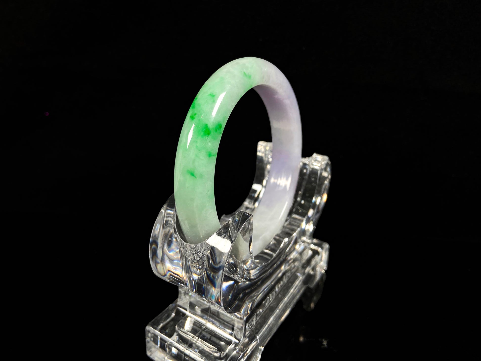 A lavender kissed spring jadeite bangle.