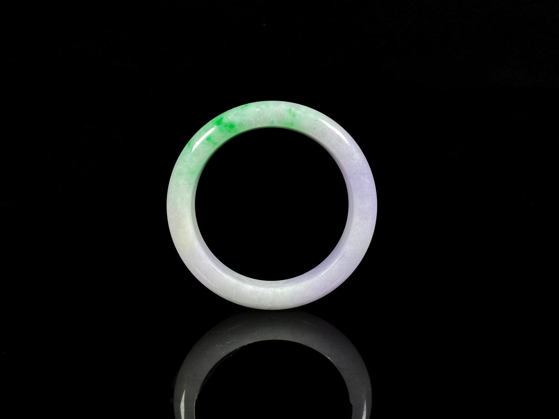 A lavender kissed spring jadeite bangle.