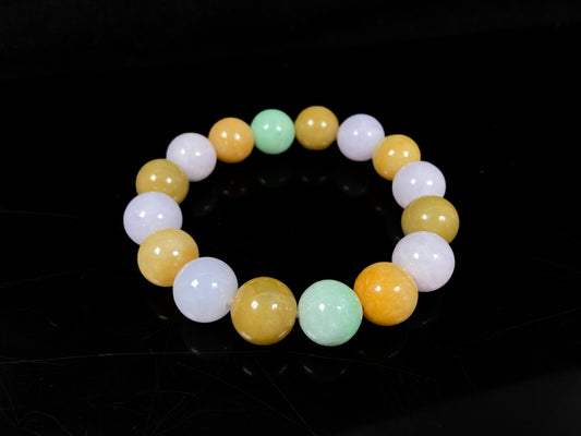 A yellow green purple jadeite beads bracelet.