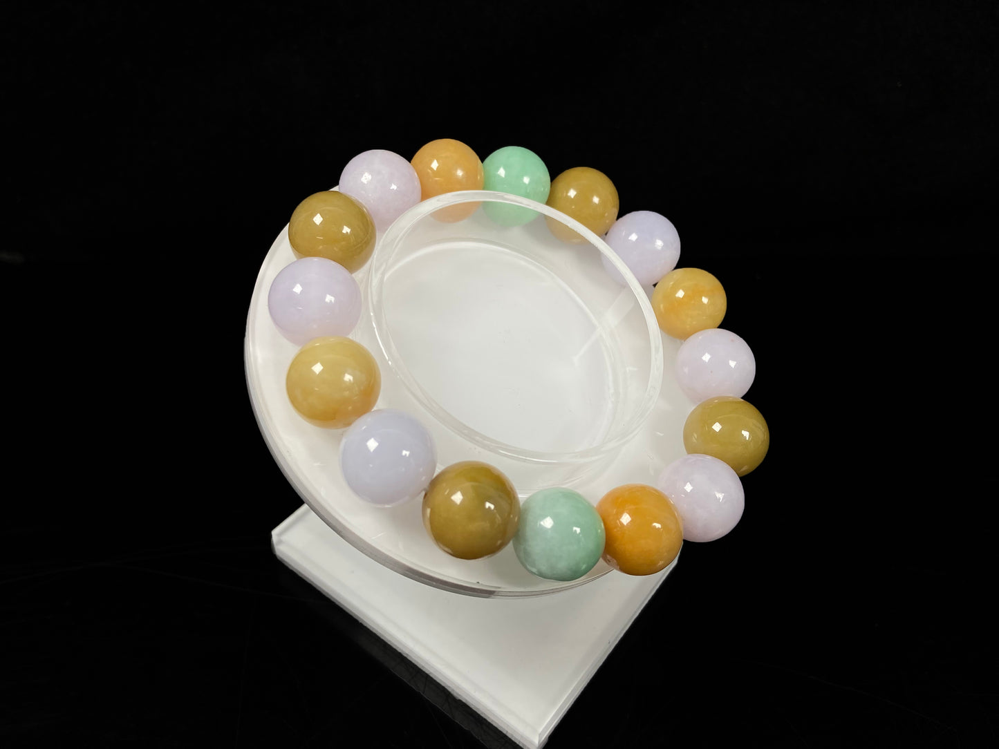 A yellow green purple jadeite beads bracelet.