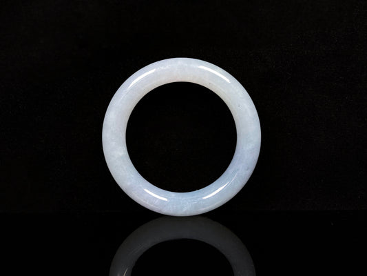 A moonlit white with pale blue jadeite bangle.