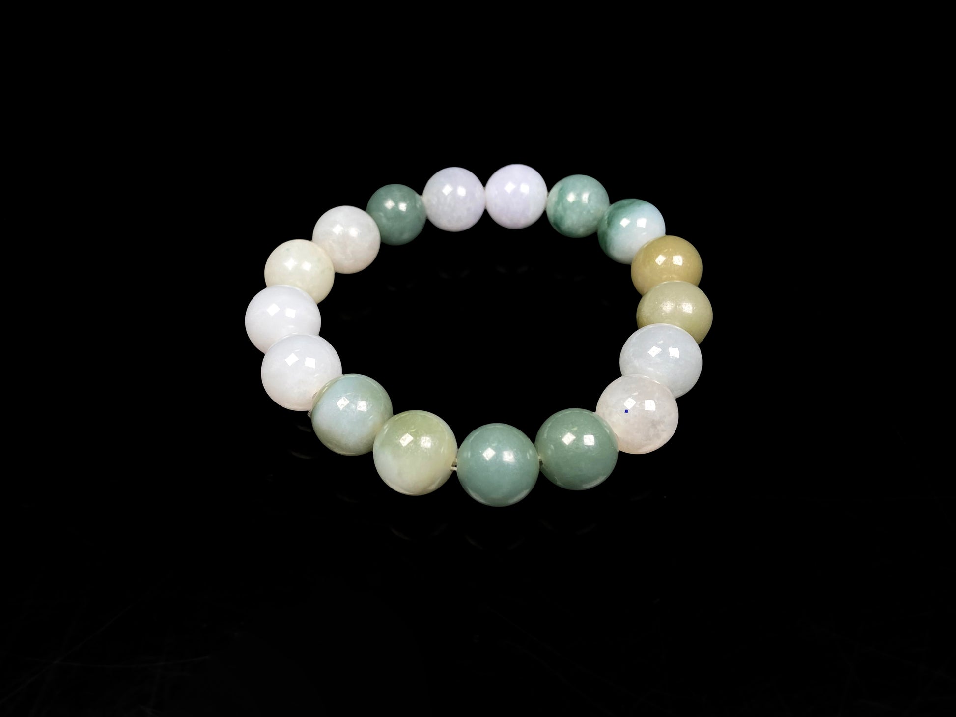 A green mist blended with white jadeite beads bracelet.