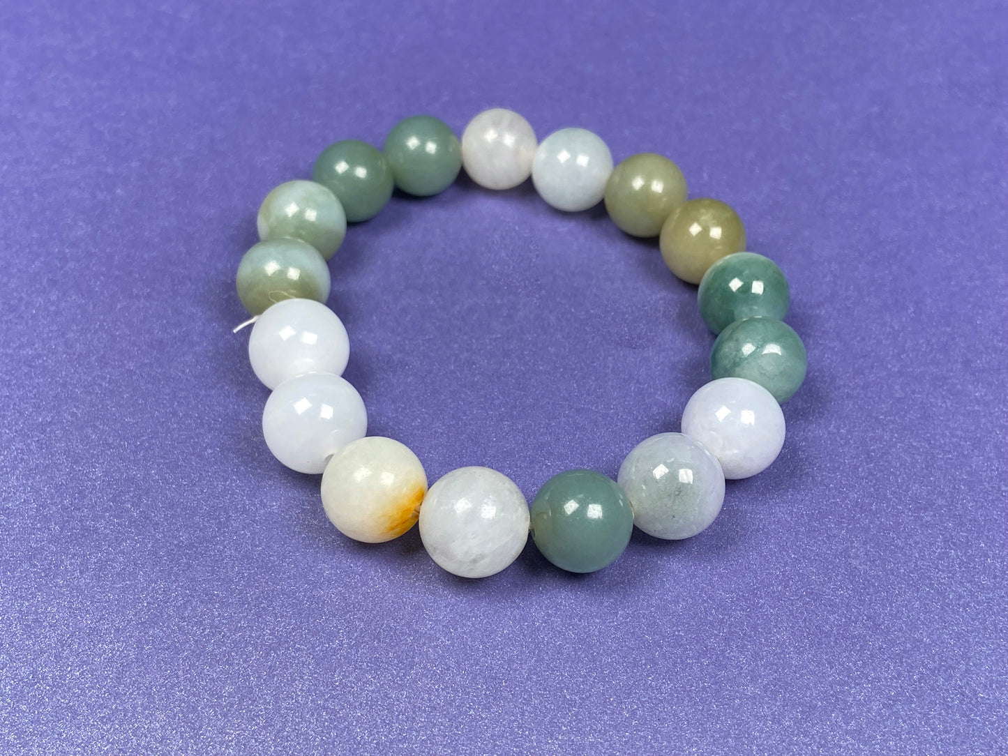 A green mist blended with white jadeite beads bracelet.