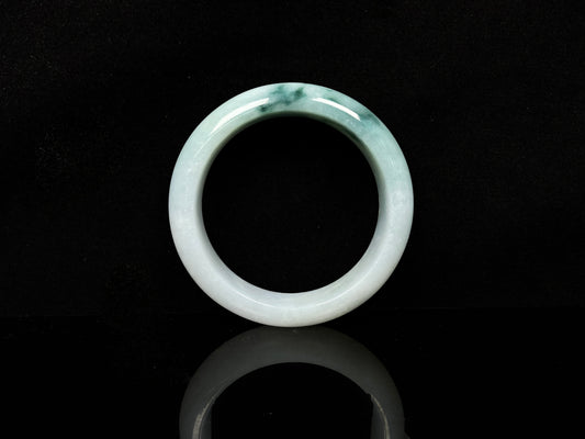A blue green hues jadeite bangle.