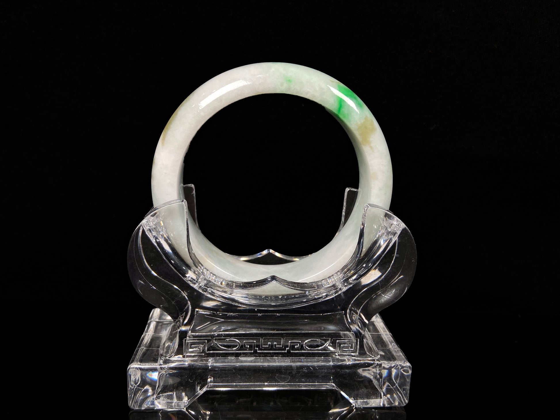 A green sprout jadeite bangle.