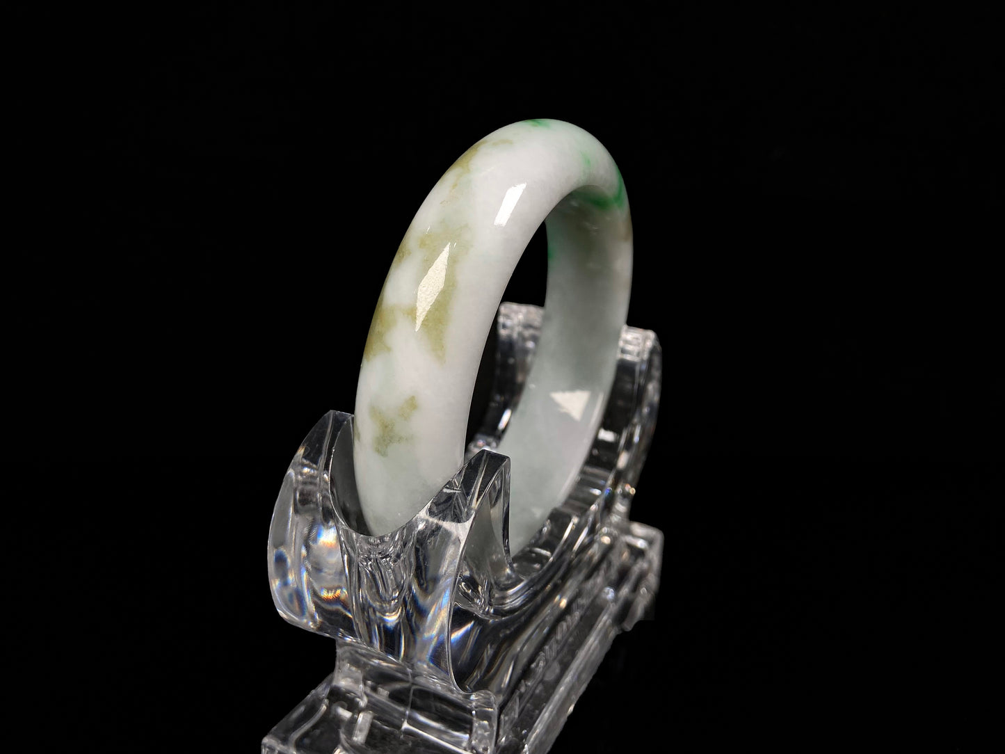 A green sprout jadeite bangle.