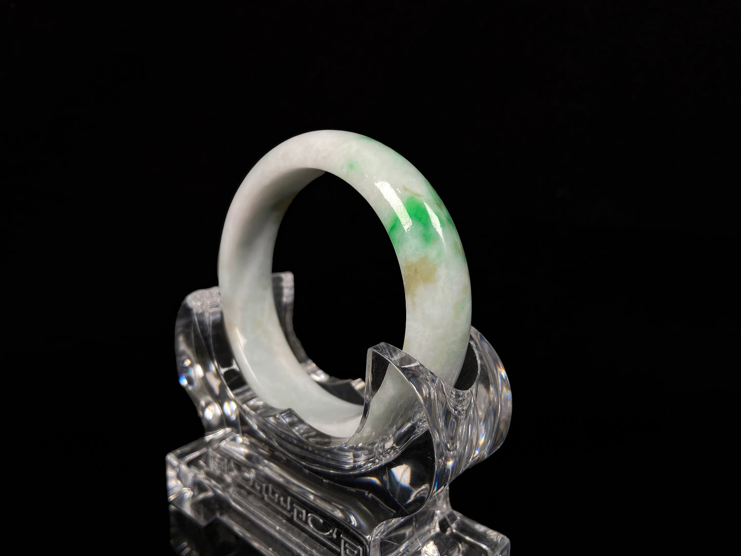 A green sprout jadeite bangle.