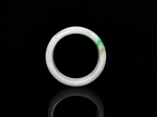 A green sprout jadeite bangle.