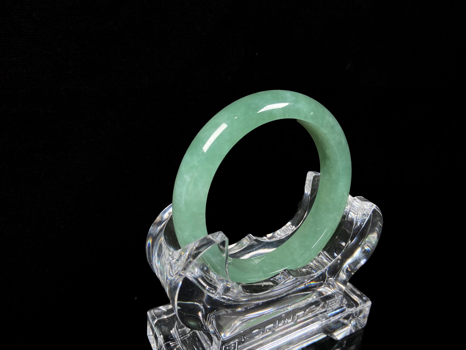 A verdant mist jadeite bangle.