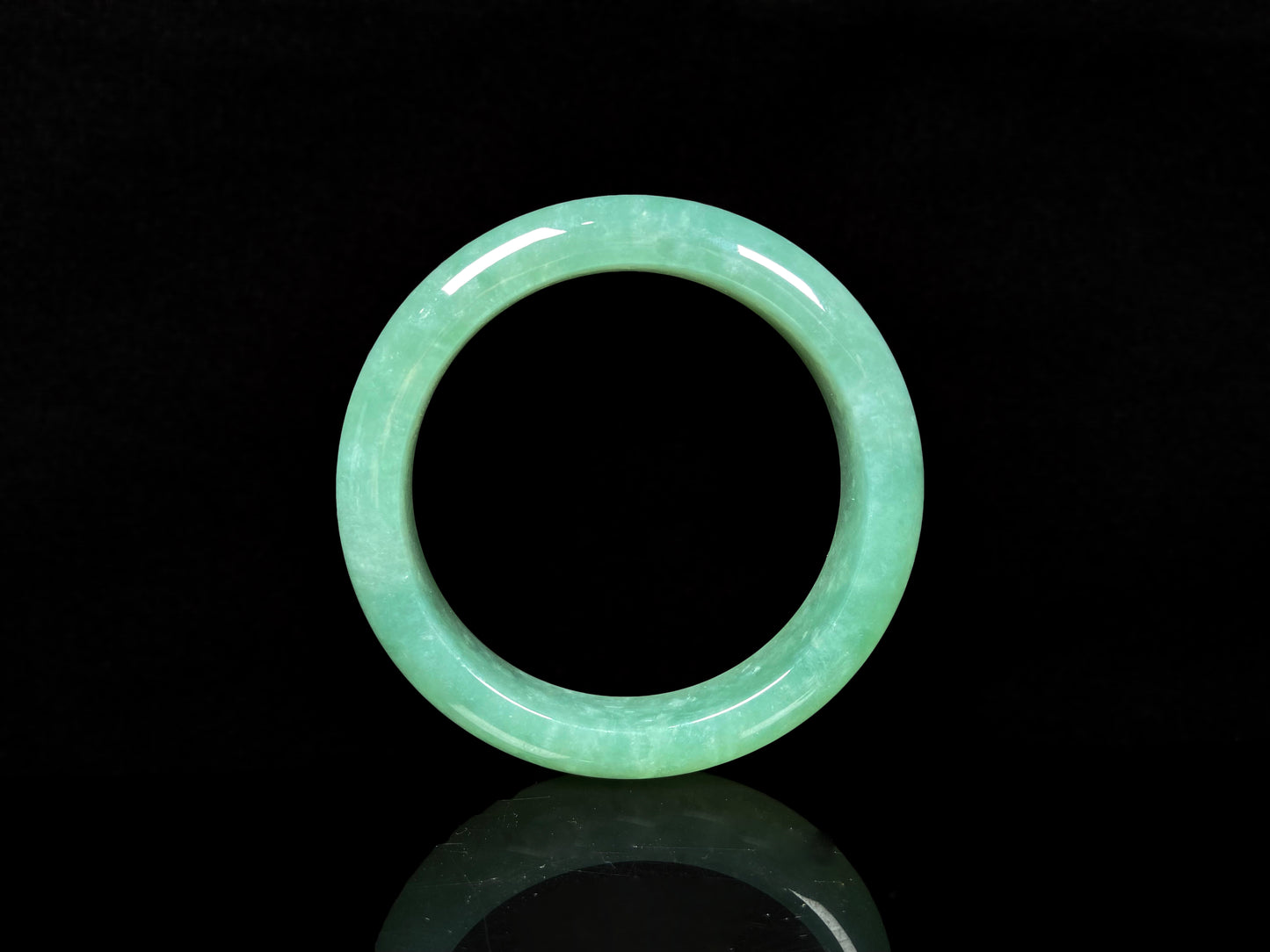 A verdant mist jadeite bangle.
