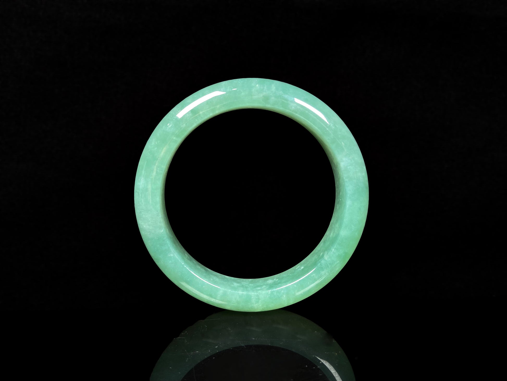 A verdant mist jadeite bangle.