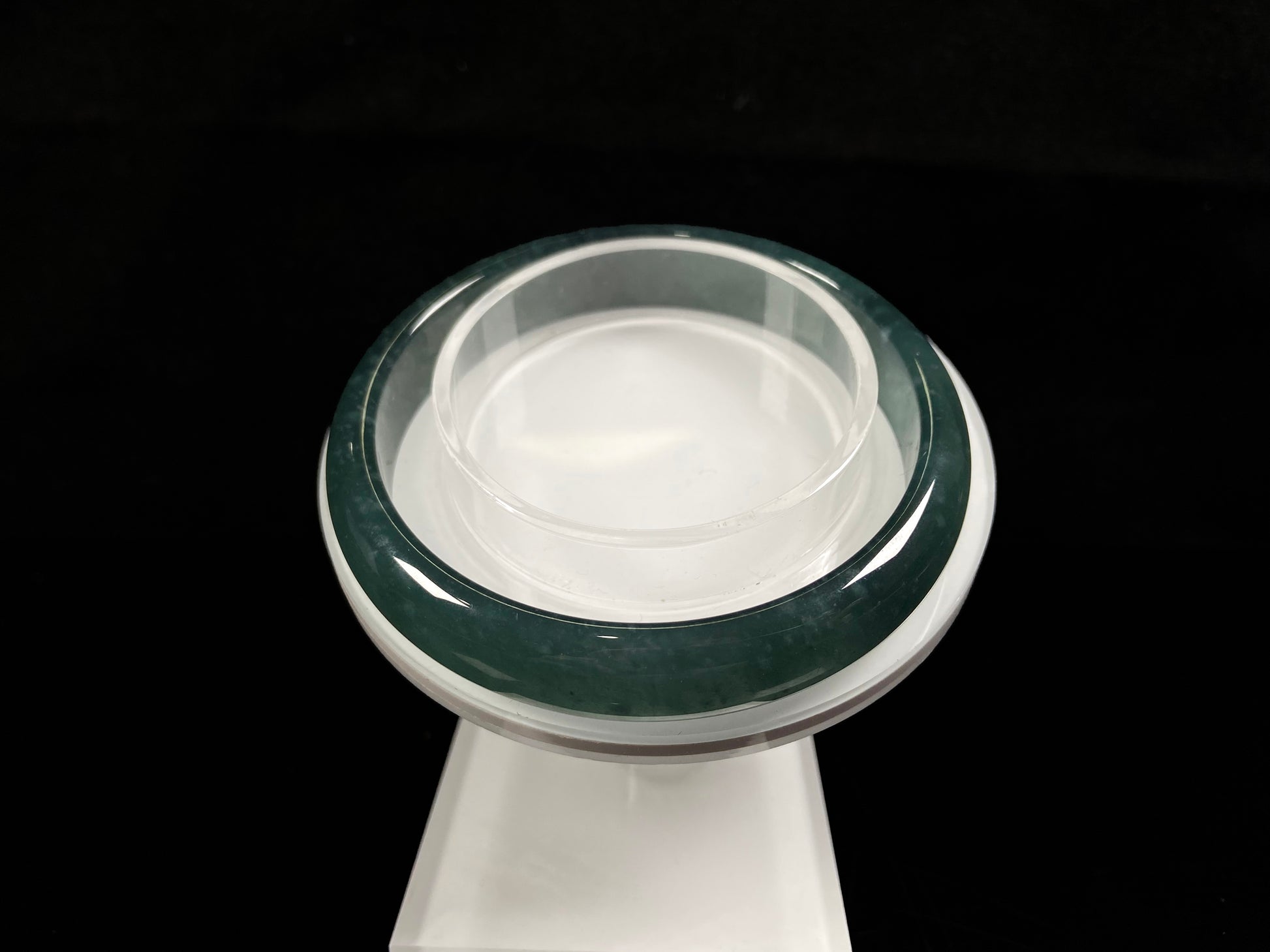 A soft deep blue-green jadeite  bangle.