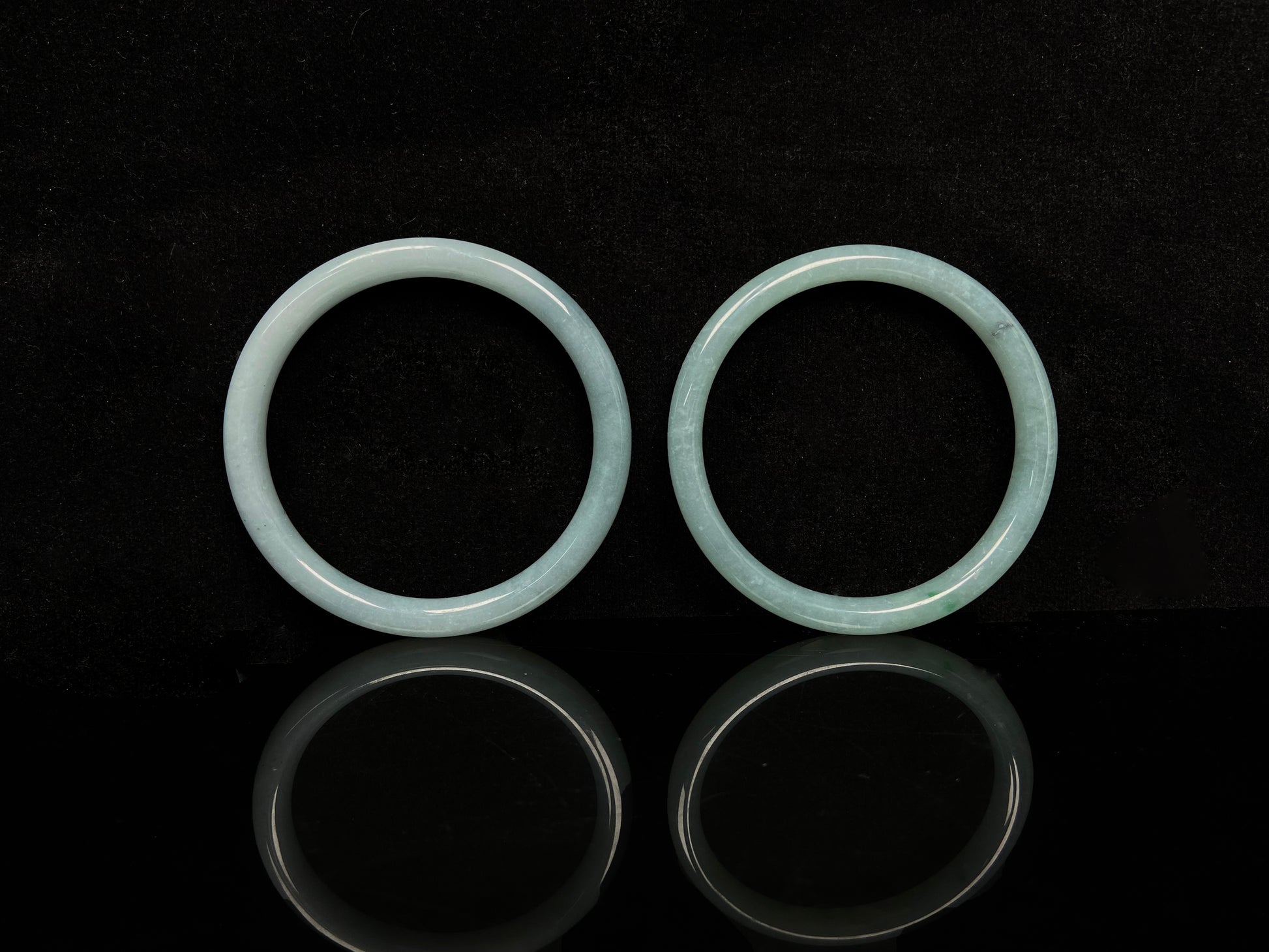 A gentle celadon mist pair jadeite bangle.
