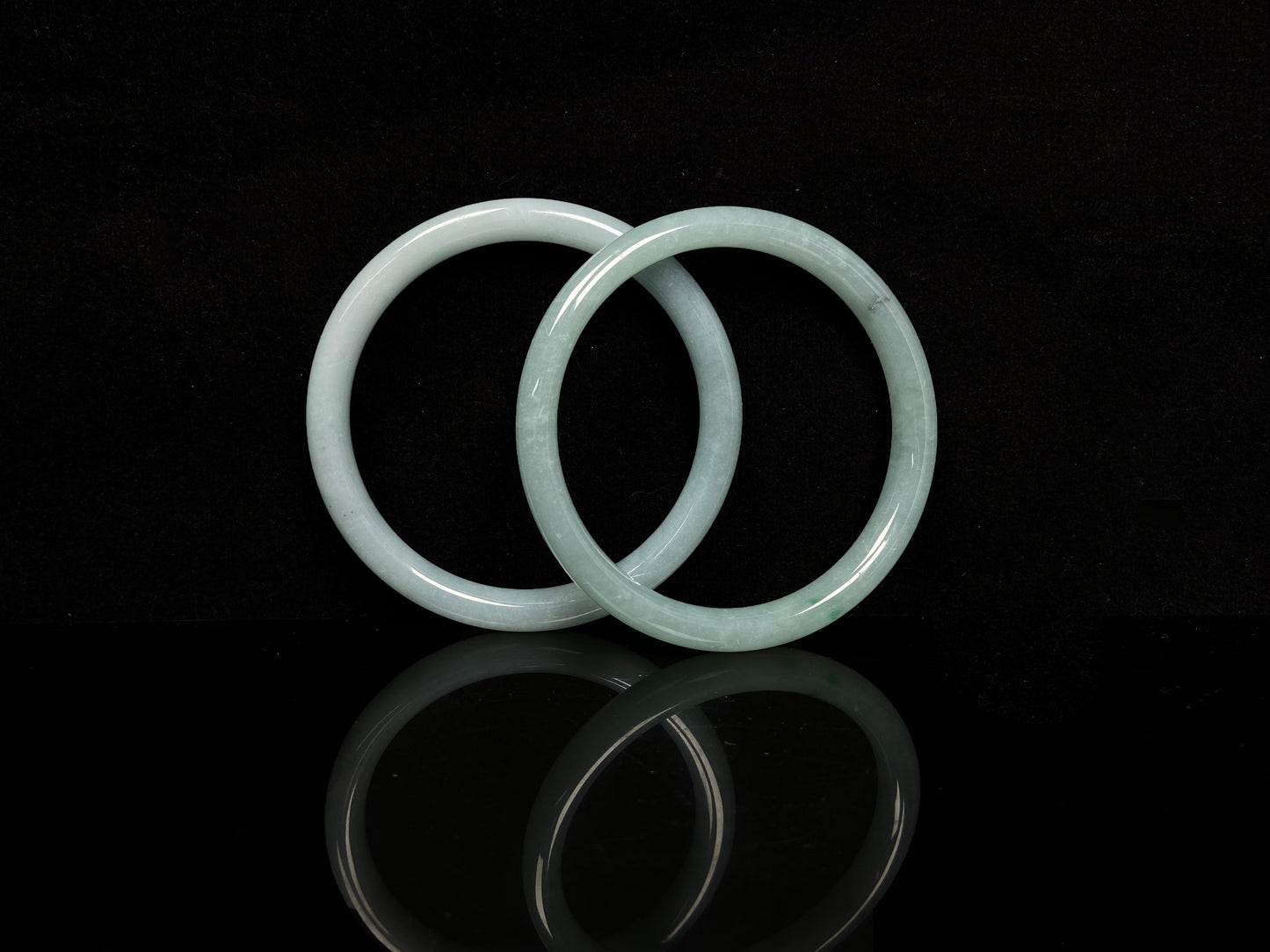 A gentle celadon mist pair jadeite bangle.