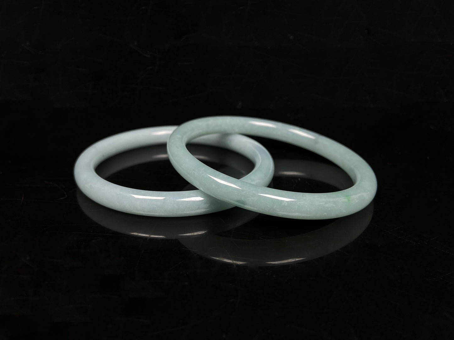 A gentle celadon mist pair jadeite bangle.