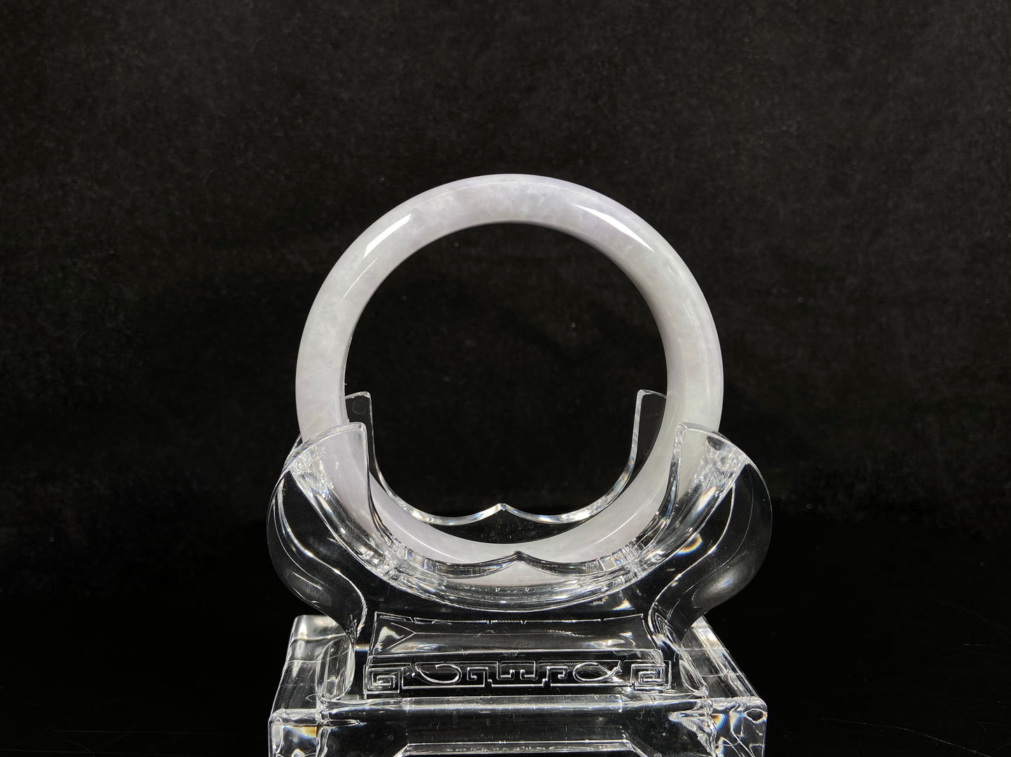 A milky white serenity jadeite bangle.