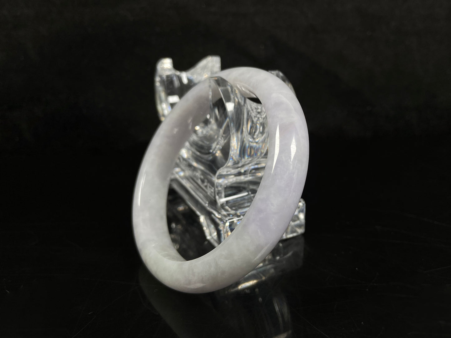 A milky white serenity jadeite bangle.