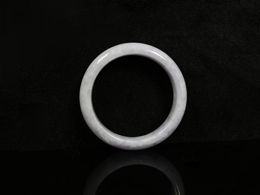 A milky white serenity jadeite bangle.