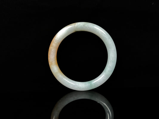 A sunset ice jadeite bangle.